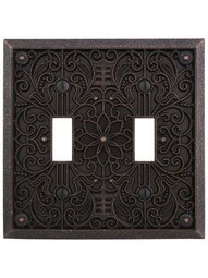 Filigree Double-Toggle Switch Plate in Aged Bronze.